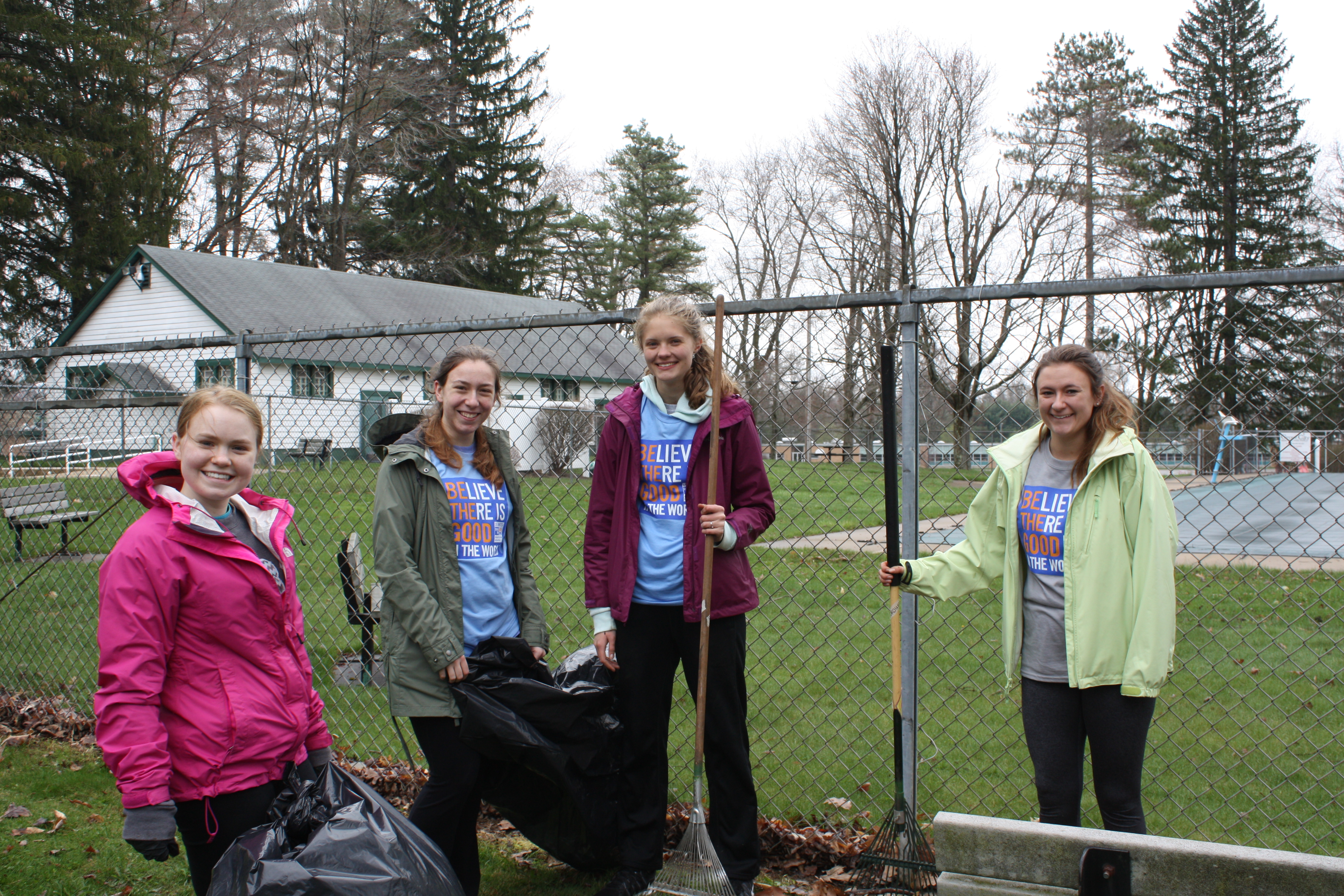 2018 Day of Caring GCC Students Raking at the Park